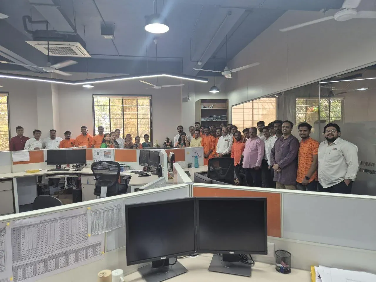 Urja-Disha team gathered in the engineering bay in traditional attire for the celebration