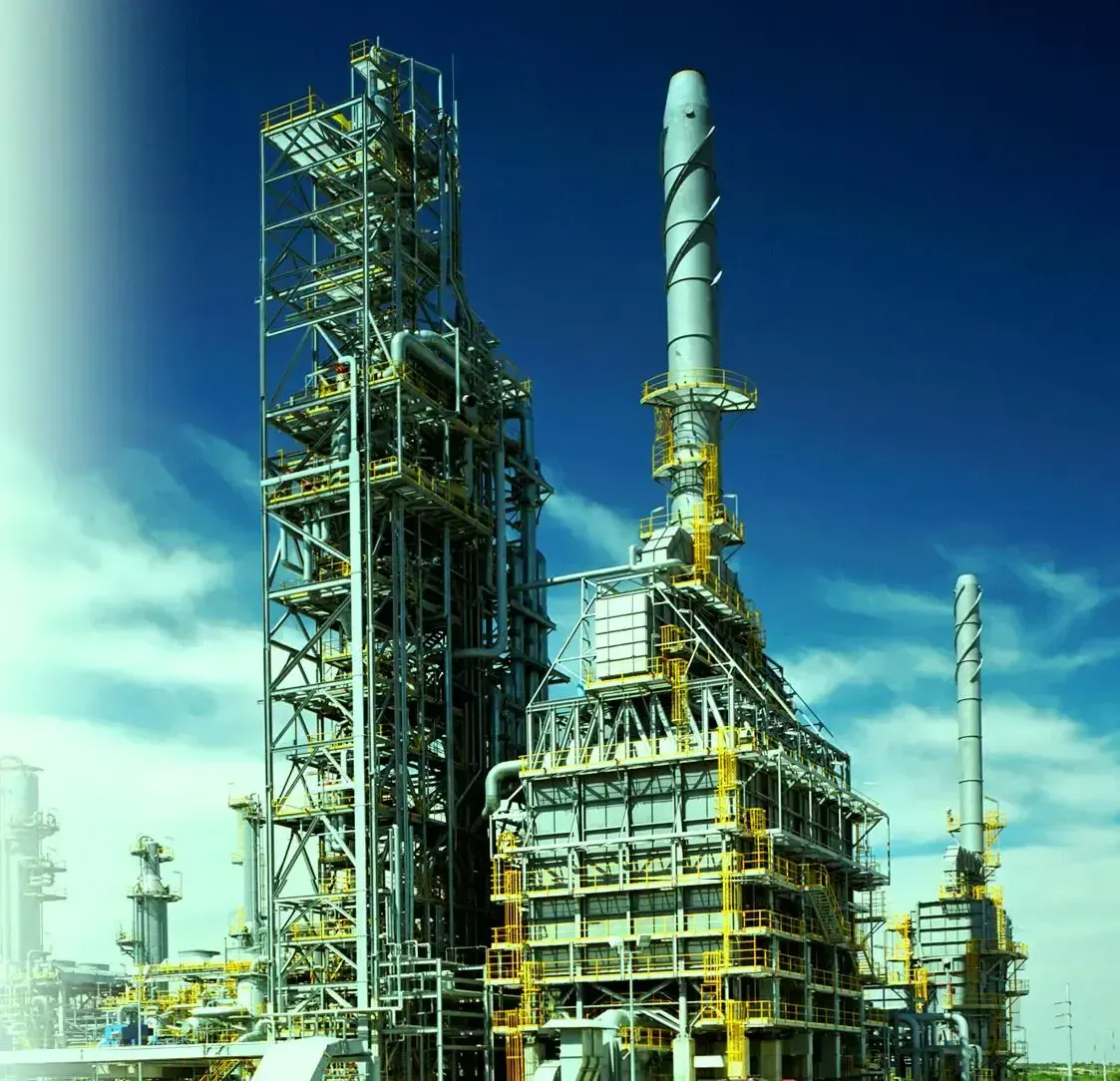 Box type fired heater and tall stacks in a refinery unit with access platforms and pipework