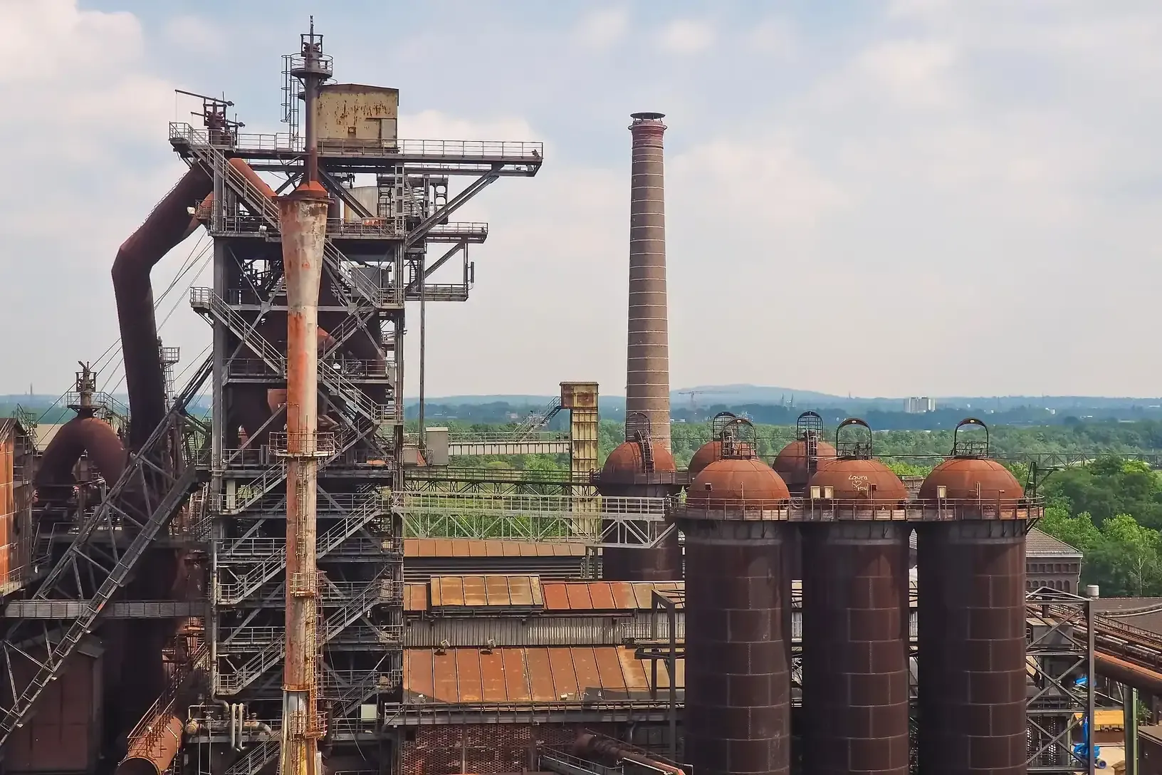 Modern steel manufacturing plant with thermal management systems